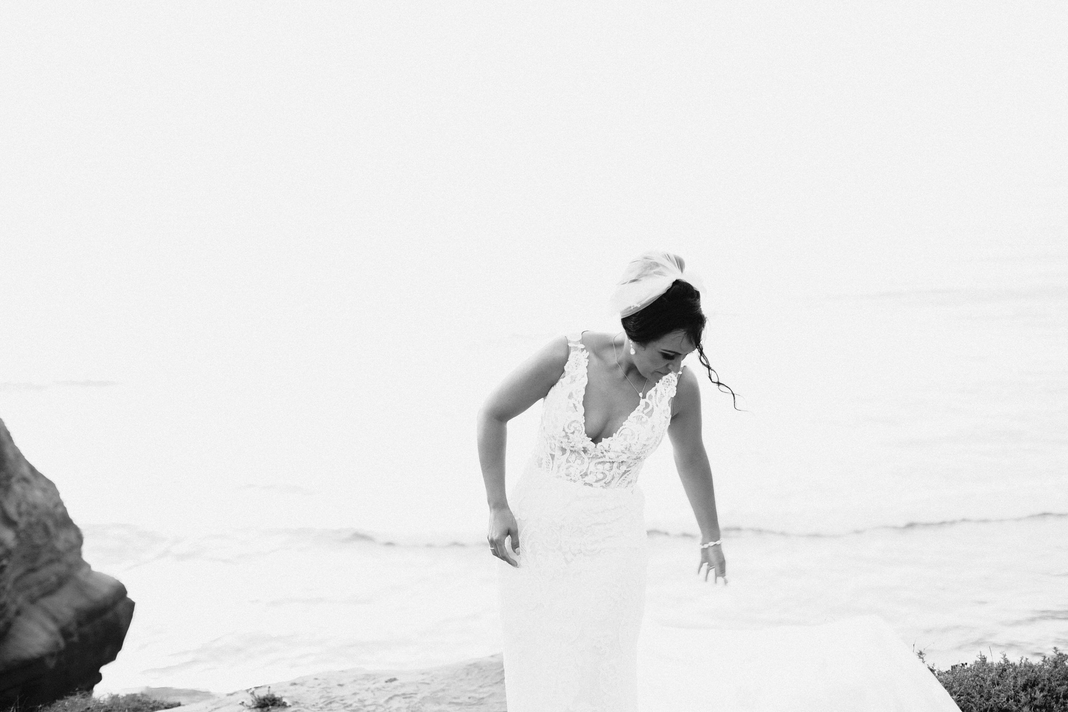 Bride and groom sunset portraits at Sunset Cliffs.