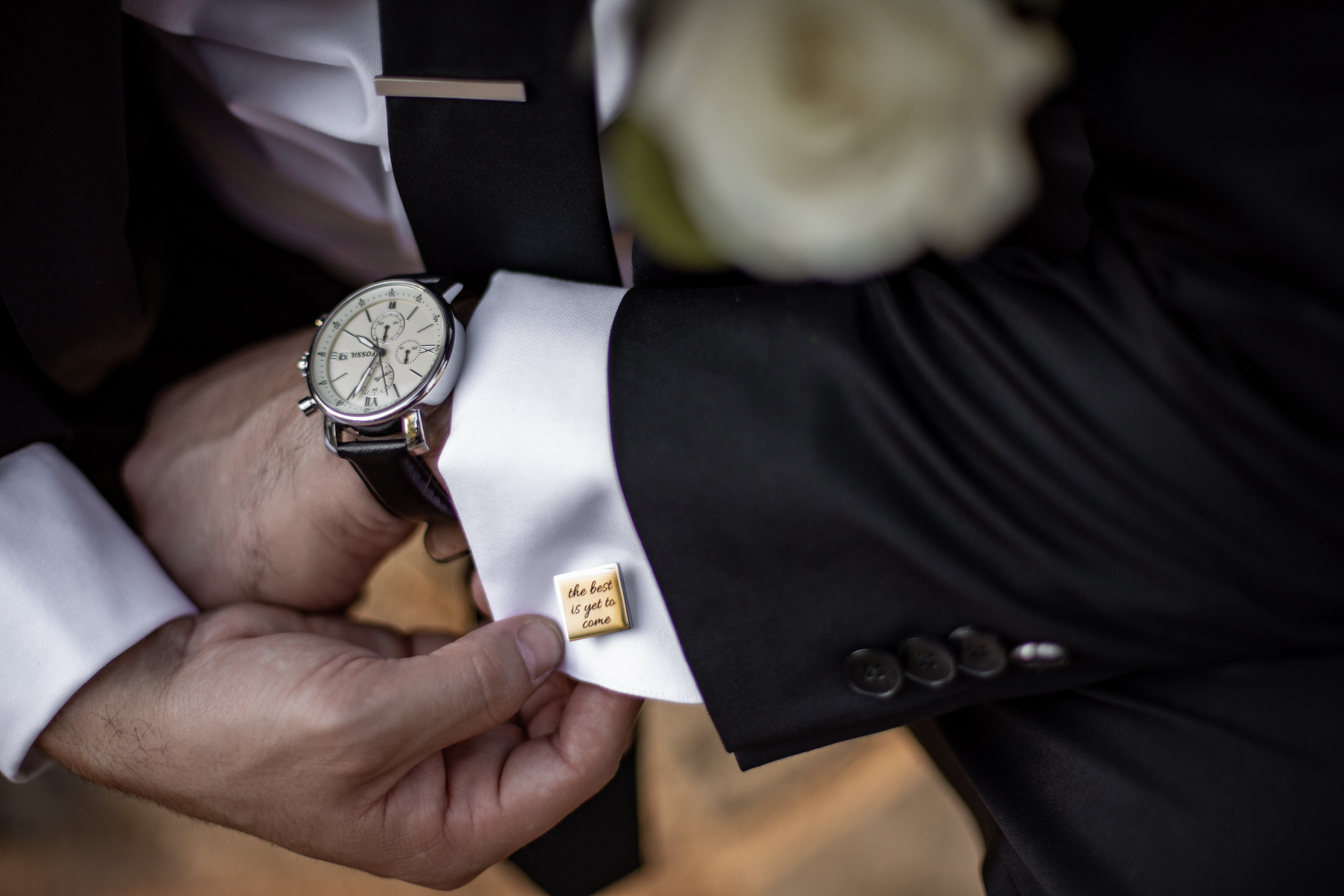 The grooms cufflinks and watch.