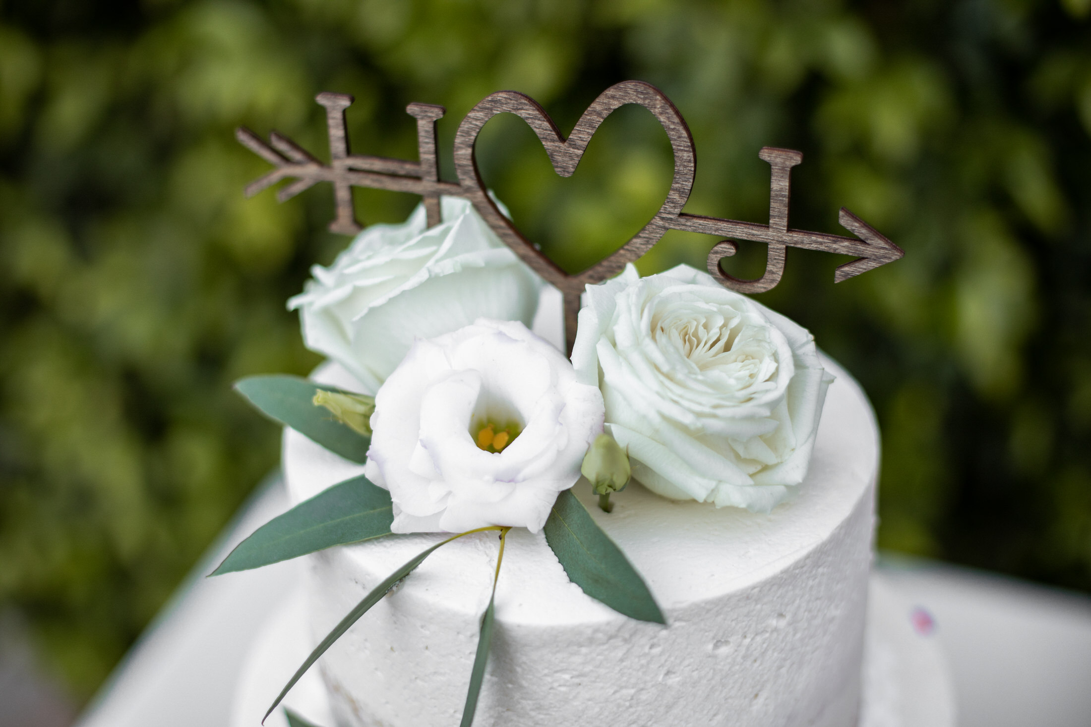 Simple, white wedding cake.