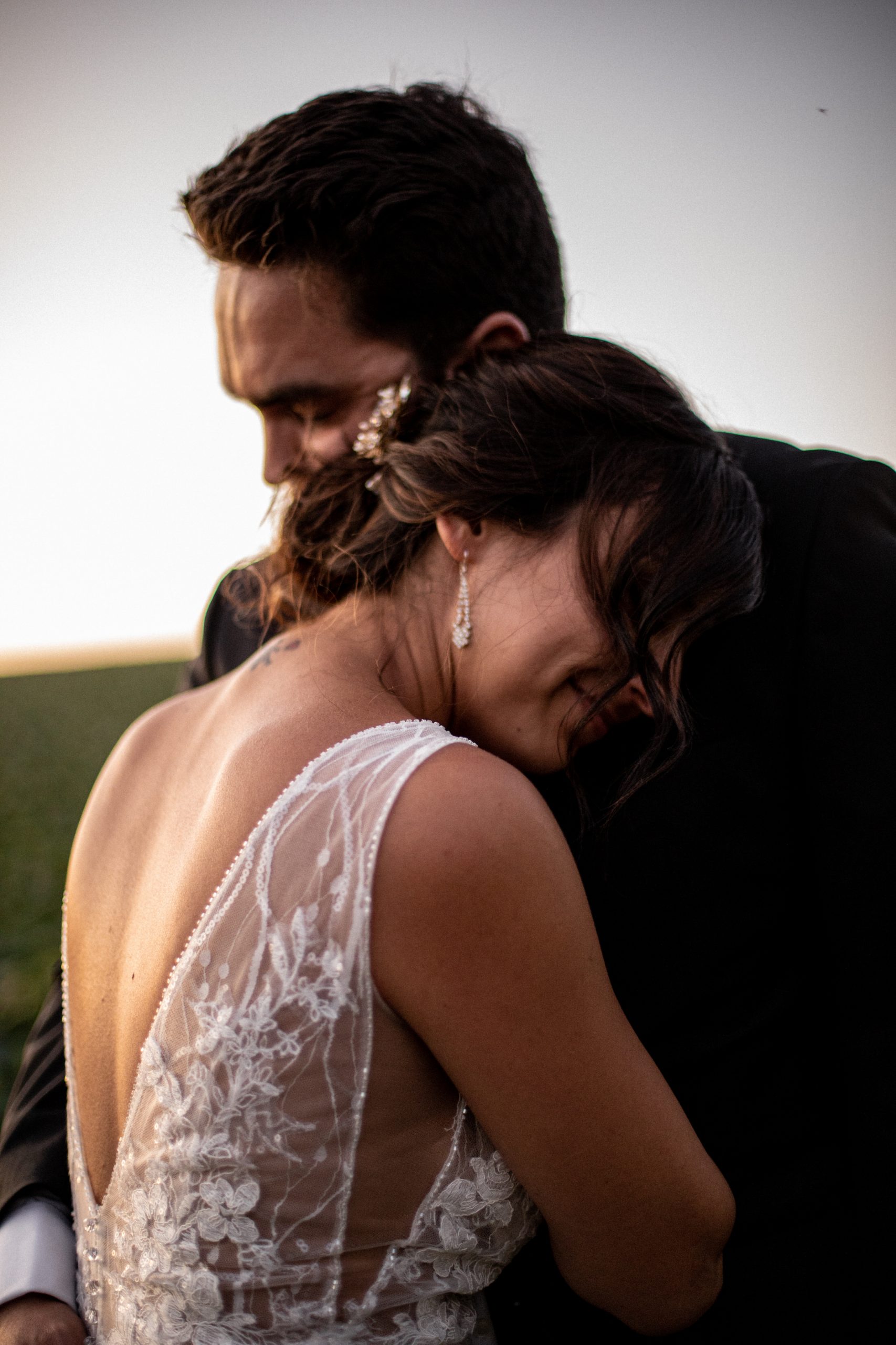 Bride and groom portraits at sunset.
