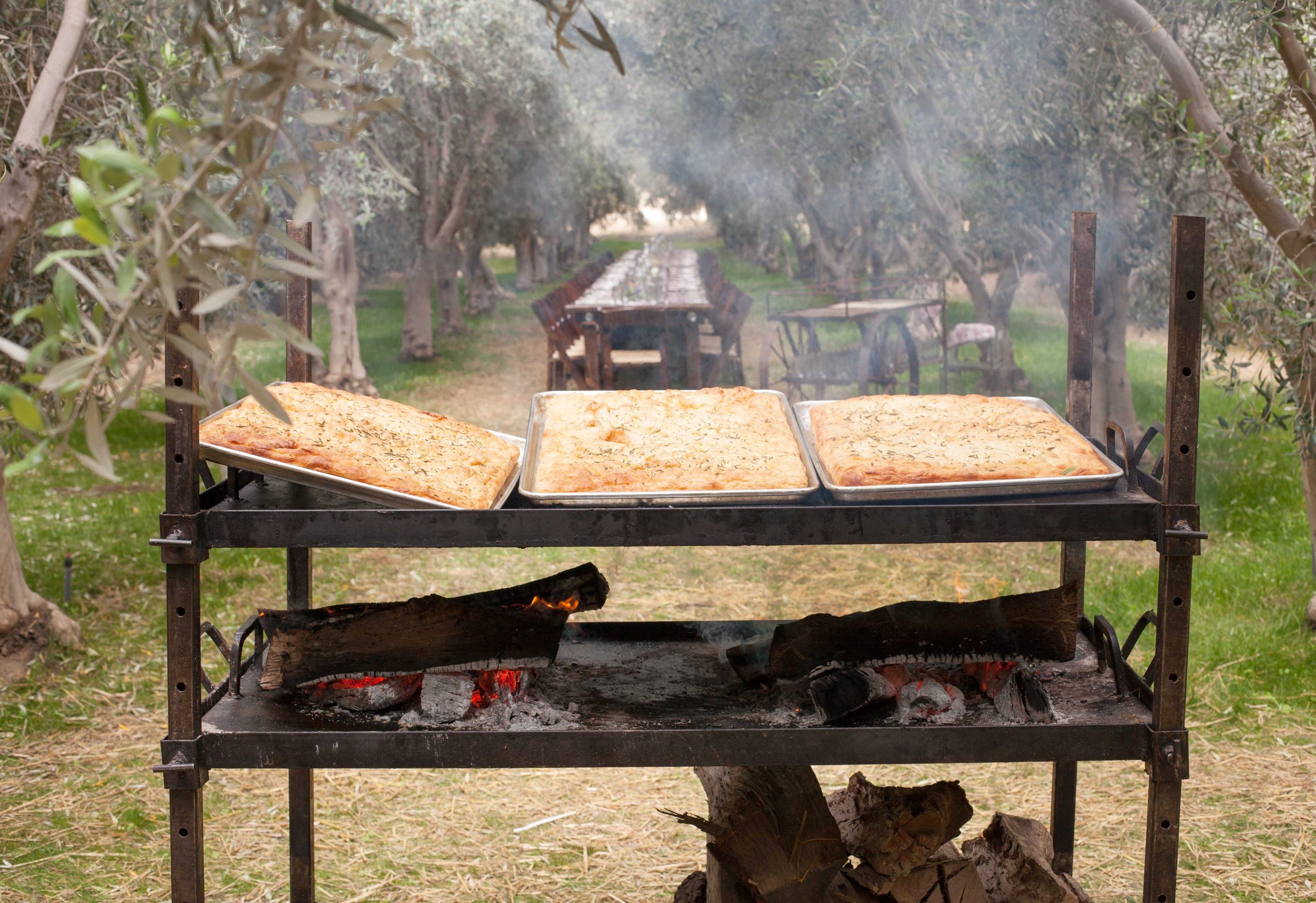foccacia cooking on an open fire