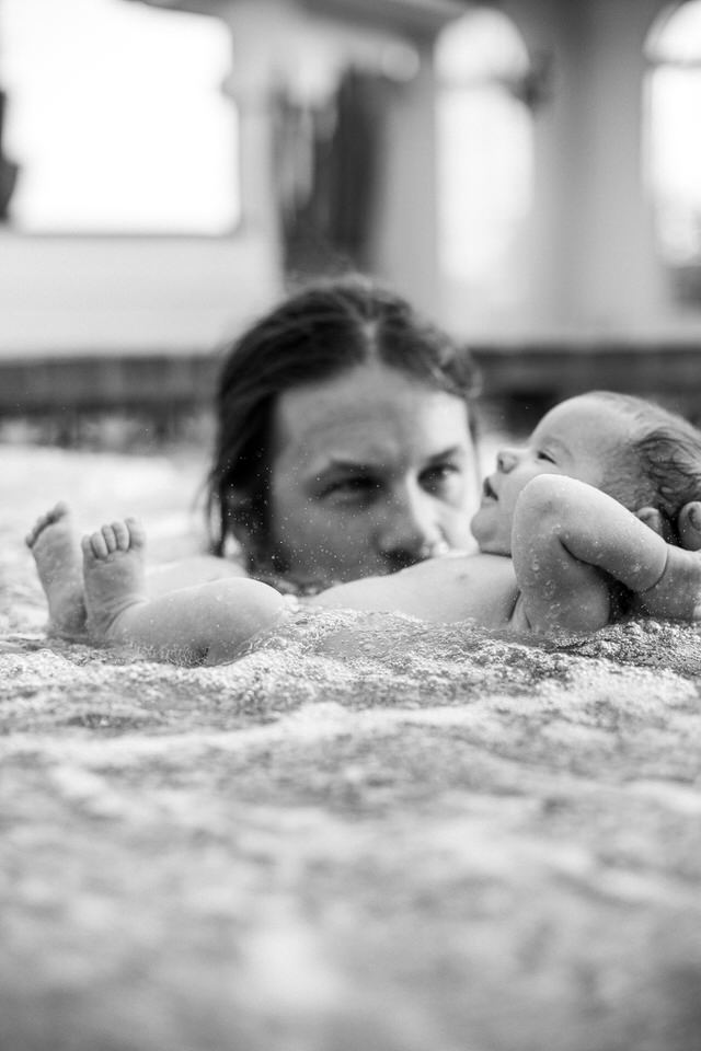 New born lifestyle photography in water.